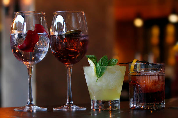 istock four colorful cocktails on a bar 504370390