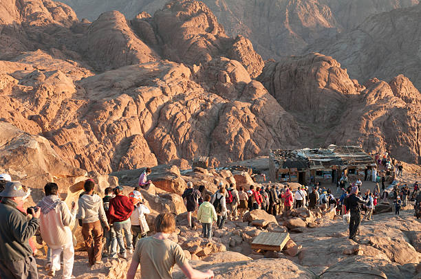 Mount Sinai, Egypt - May 25, 2010: Large numbers of pilgrims and other tourists descend the summit of Mount Sinai after watching the sunrise