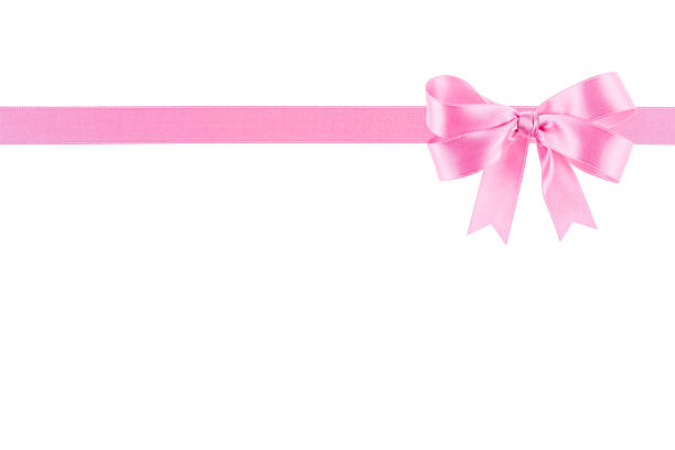 istock Pink ribbon with a bow on white background 504371813