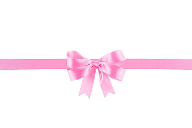 istock Pink ribbon with a bow on white background 504371815