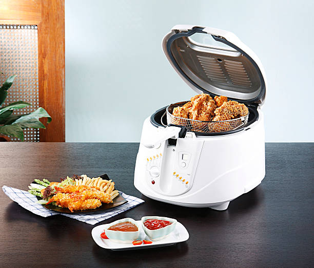 istock Electric fry chichen pot in the kitchen interior 504372139