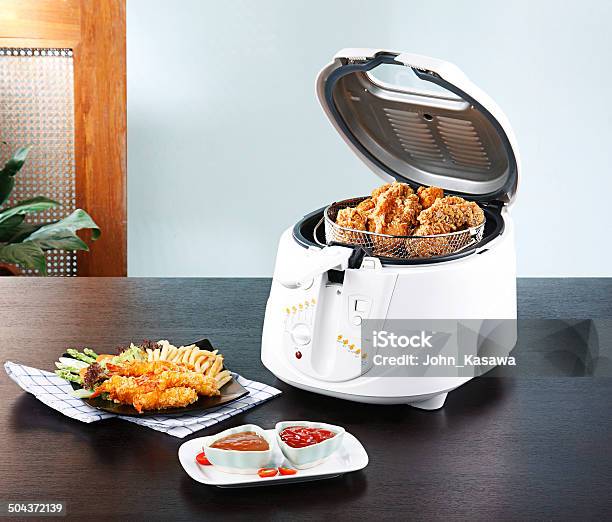 Electric Fry Chichen Pot In The Kitchen Interior Stock Photo - Download Image Now - Appliance, Cooking Pan, Domestic Kitchen