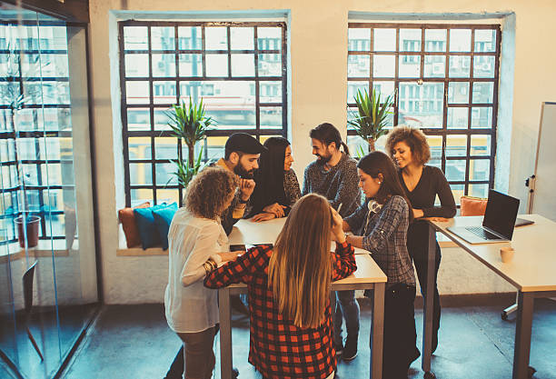 istock young people having meeting at the office 504372282