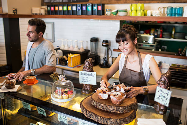 istock Small business owner in her coffee shop 504373180
