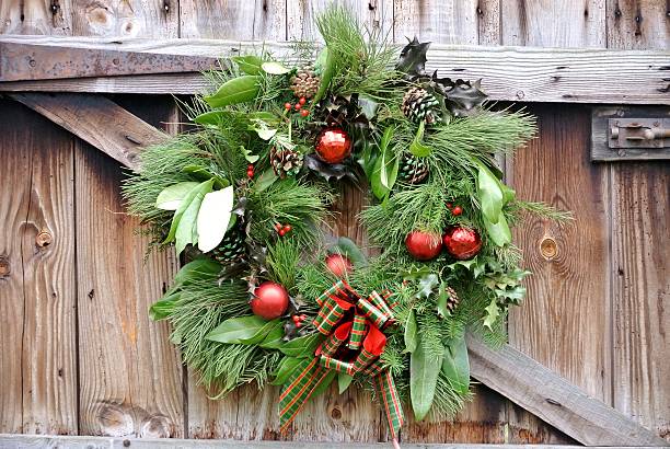 istock Christmas Wreath on Wooden Gate 504374310