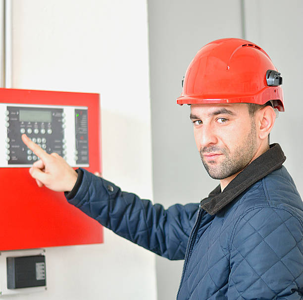 istock Electrician Wearing Hard Hat at Job Site 504374616