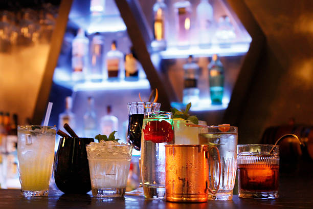 istock cocktails in a row  in blur background on a bar 504374800