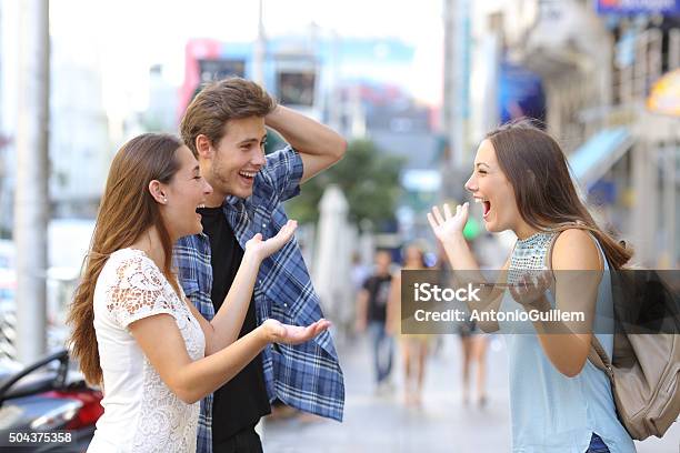 Happy Friends Meeting In The Street Stock Photo - Download Image Now - Adult, Beautiful People, Beauty