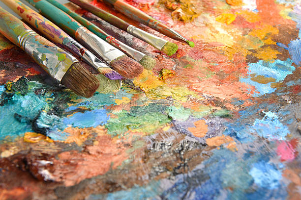 istock Artist Paintbrushes Over Palette 504375634