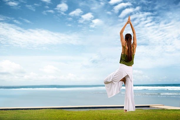 istock Yoga by the sea 504375834