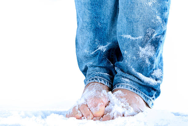 Waiting bare feet on the snow stock photo
