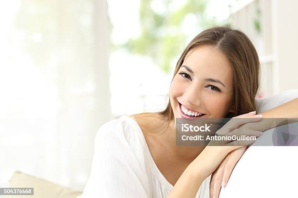 Beauty Woman With White Smile At Home Stock Photo - Download Image Now - Beauty, Smiling, Women