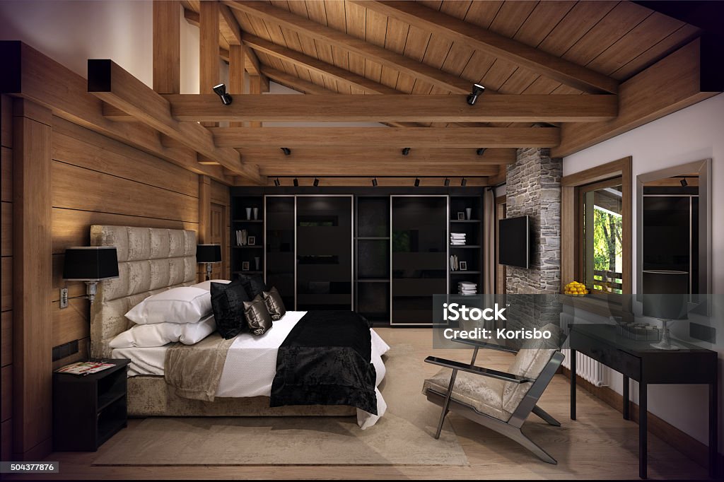 3D rendering bedroom house in the mountain 3D rendering cozy bedroom is in the attic of a chalet. Huge bed with numerous pillows is dominates the room. The interior is decorated with wood and natural materials. Chalet Stock Photo