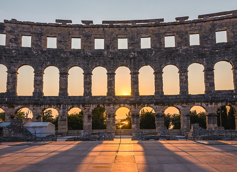 Inside of Ancient Roman Amphitheater in Pula, Croatia, Famous Travel Destination, in Sunny Summer Evening