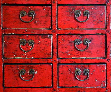 Crop of Red Chinese Lacquered Apothecary Cabinet used for background image or sites