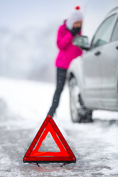 istock car breakdown in winter seasone 504379686