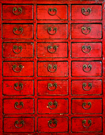 Crop of Red Chinese Lacquered Apothecary Cabinet used for background image or sites