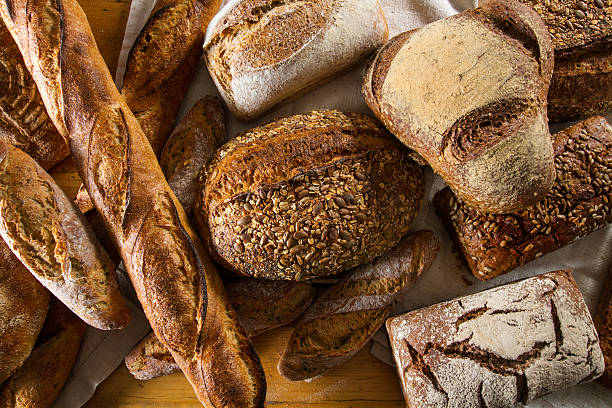 Variety of loaves of bread stock photo