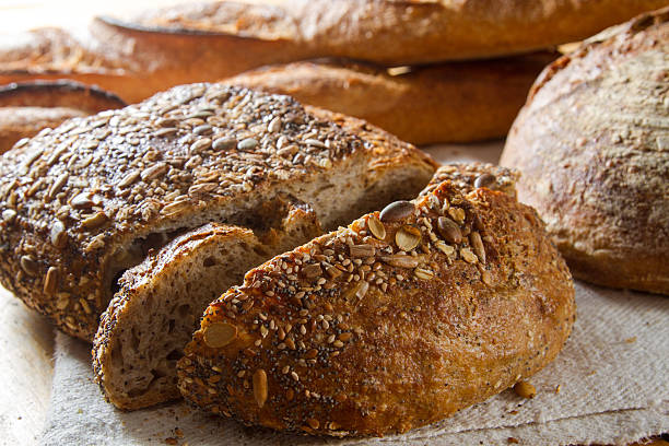 Loaf of brown multigrain bread stock photo