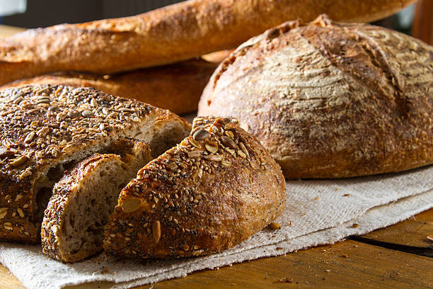 Loaf of brown multigrain bread stock photo