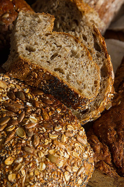 Loaf of brown multigrain bread stock photo