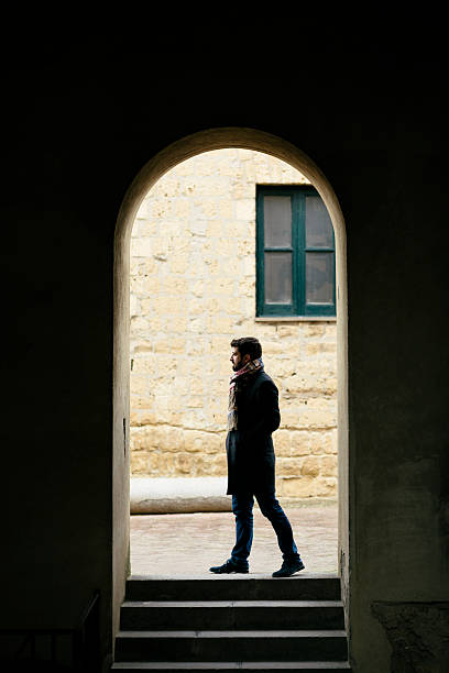 Silhouette of a young man