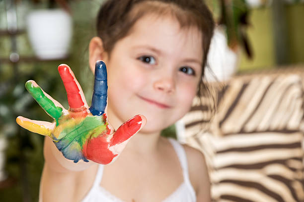 istock Elongated children hand painted colors 504382570