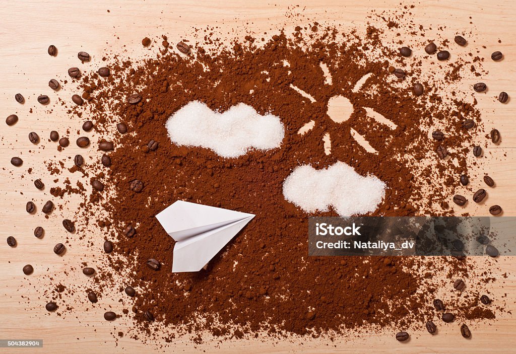 coffee travel the coffee and paper airplane, top view. Travel concept Air Vehicle Stock Photo