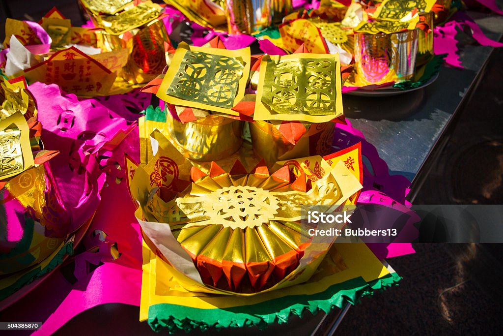Pattern of Joss Paper, Chinese Tradition for Passed Away Ancesto Pattern of Joss Paper, Chinese Tradition for Passed Away Ancestor's spirits. Incense Stock Photo