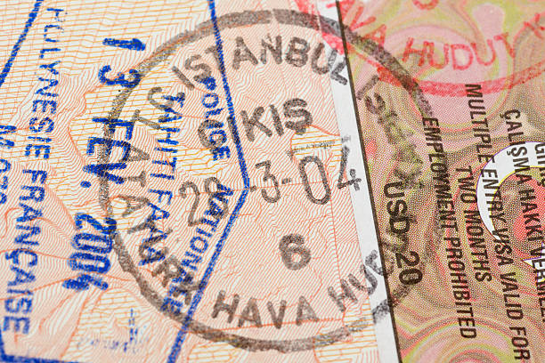 istock Passport page with Turkey visa and immigration control stamp. 504385914