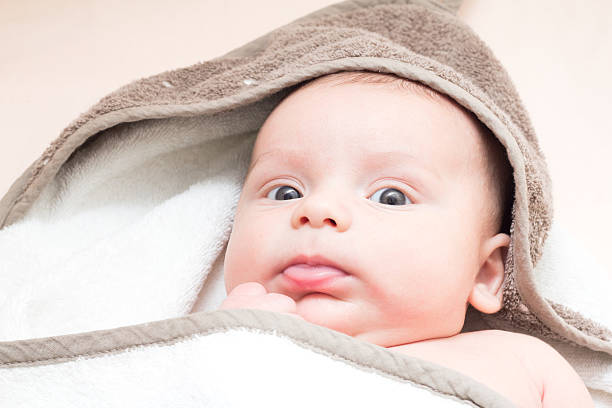 istock Two month baby in towel 504386456