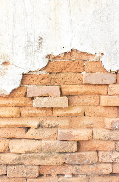 istock old cracked concrete vintage brick wall background 504397839