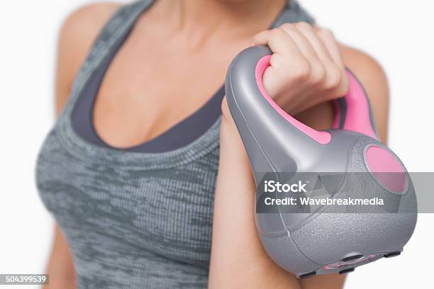 Close Up Of Young Woman Training With Kettle Bell Stock Photo - Download Image Now - Adult, Athlete, Beautiful People