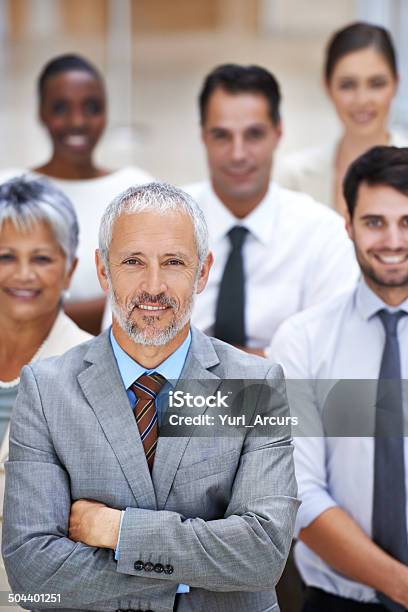We Turn Possibilities Into Realities Stock Photo - Download Image Now - Corporate Business, Mature Adult, Multiracial Group
