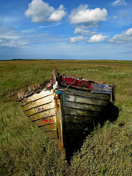 Suffolk mudflats with old boat