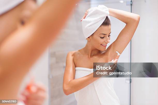Woman Shaving Armpit In Bathroom Stock Photo - Download Image Now - Shaving, Women, Armpit