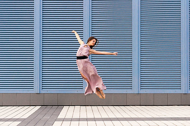 istock Jumping ballerina background plastic shutters 504402803