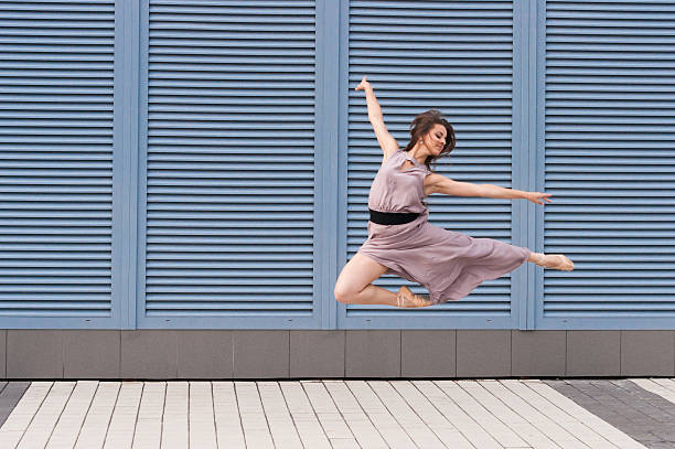 istock Jumping ballerina background plastic shutters. 504403571