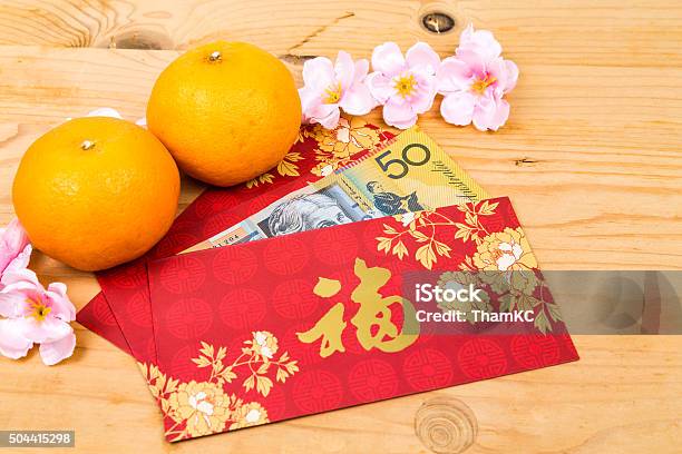 Red Packet With Good Fortune Character Contains Australian Dolla Stock Photo - Download Image Now