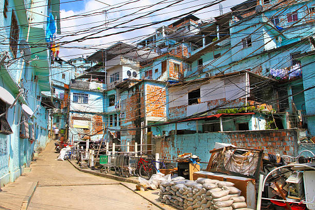 Inside the favela in Rio de Janeiro Observe the Illegal electricity connections (gato) favela stock pictures, royalty-free photos & images