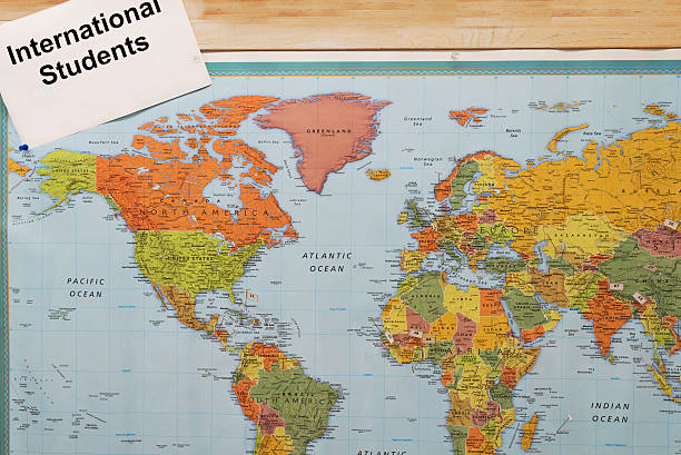 istock international students around the world on map concept 504418790