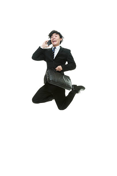 istock Businessman jumping in the air 504419046