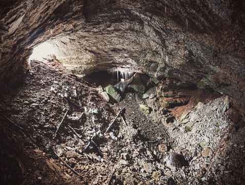 A wide panoramic view inside a natural dissolution cave formed in gypsum.