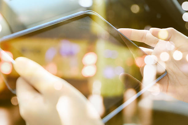 istock people sitting in the car using digital tablet 504419716