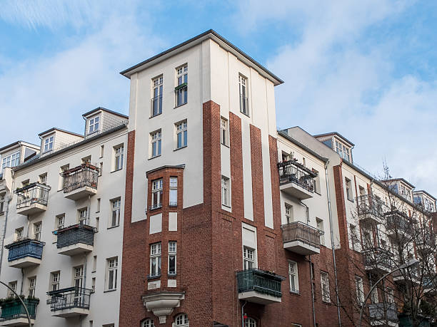 istock Renovated Apartment Building with Small Balconies 504422060