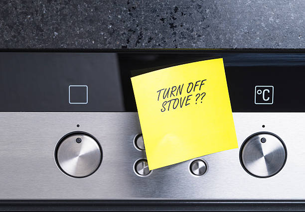Turn off stove stock photo