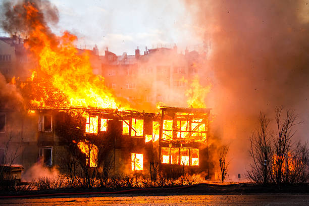 Fire in a house Fire in an old wooden house burning house stock pictures, royalty-free photos & images