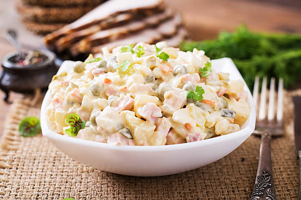 Traditional Russian salad "Olivier" Traditional Russian salad "Olivier"Traditional Russian salad "Olivier". Top view mayonnaise photos stock pictures, royalty-free photos & images