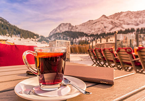 istock Warm drink and restaurant menu on table in alpine decor 504427294