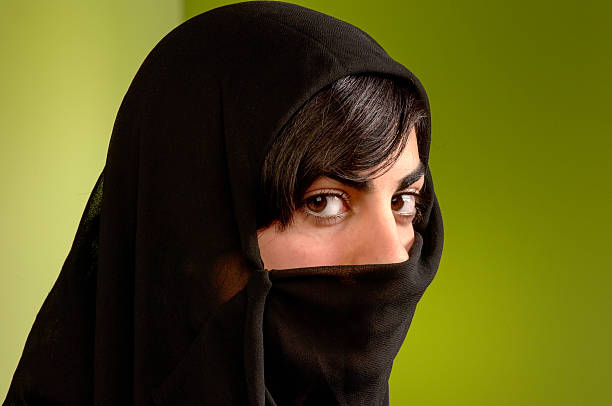 istock woman in black veil 504428408
